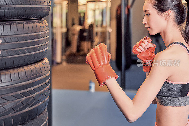 Fitness girl working out in a gym